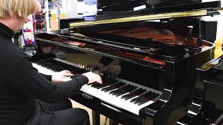 Yamaha C2X grand piano in polished ebony