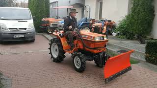 Kubota Bulltra z pługiem do odśnieżania