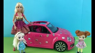 Barbie's Car! Elsa and Anna Toddlers put Hello Kitty Stickers on Barbie's Pink Convertible!