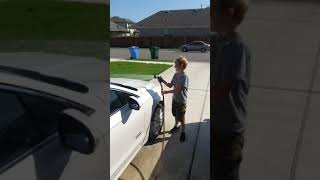 Jaden Rinses the Car