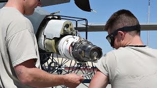 Airmen Perform Maintenance On KC-10 Aircraft