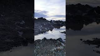 Puddle of melted snow in the mountains