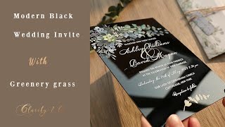 45. black acrylic invitations with grass design