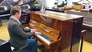 Kawai K-3 upright piano in polished walnut