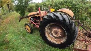 8N Ford tractor mowing with brush hog