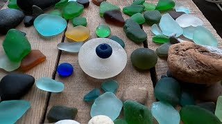 A giant piece of pottery, a second stunning bead, and a palette of colorful sea glass pieces!