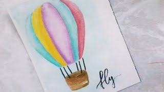 How I paint a colourful hot air balloon.