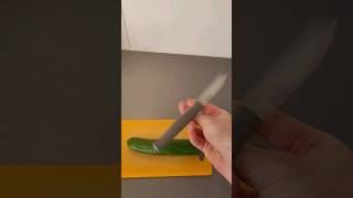 Knife and cucumber