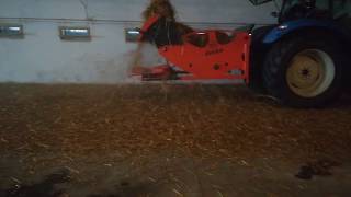 SIG Drake bedding round bale in poultry house