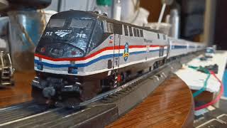 Amtrak Empire Service Departing Leading by P32AC-DM Phase IIIb No. 712 and Five Amfleets