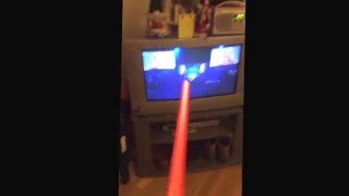 Having a light saber fight with the telly! Cabin fever, weekend alone sick