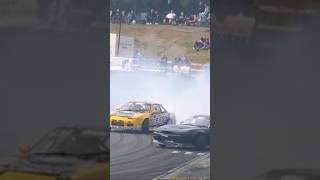 Professional drifters drifting around a track!