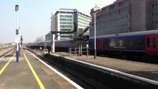 Two class 165's leave Reading centre road