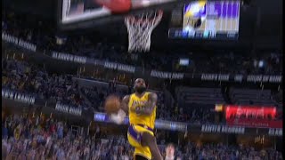 LeBron James double clutch reverse dunk to seal the win for the Lakers