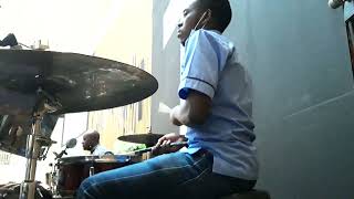 Nuwa mbere in lunch hour with Iracyaturagiye Israel on drums