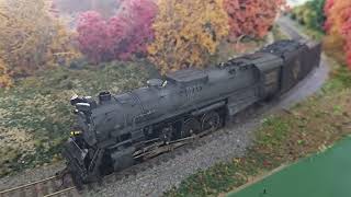 Bill Garvin runs his HO Erie Berkshire on his beautiful fall season layout.