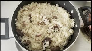 Rice cooked with oil, vegetables and beef with pepper and egg . JUST ENJOY IT AT HOME