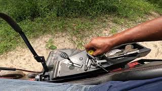 Cutting grass on the homestead