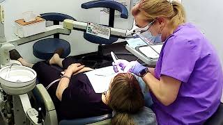 Dental care in the dental clinic / scaling teeth/ polish