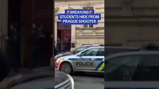 Terrified students COWER on a high ledge hiding from the Prague gunman.