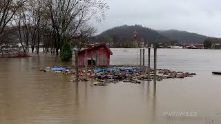 Flood Takes FireWood Pile away