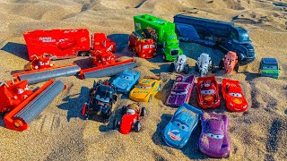 Disney Pixar Cars fall into the water: Lightning McQueen, Mater, Jackson Storm, Natalie Certain