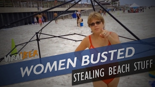 TWO WOMEN BUSTED TRYING TO STREAL GUYS BEACH STUFF