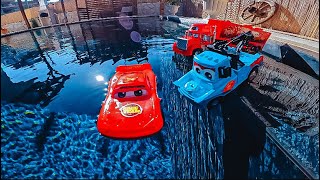 Disney Pixar Cars falling into deep pool, Lightning McQueen, Tow Mater, Mack, Sally, Francesco