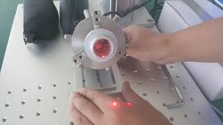 Inner ring marking by fiber laser marking machine with rotary attachment.