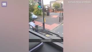 Video: Takeaway owner throws kebab through truck window as driver goes past