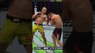 Petr Yan finally checks a leg kick and hurts Jose Aldo's shin.