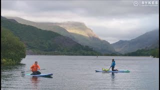 Stand Up Paddleboarding | Experience More in North Wales | Sykes Holiday Cottages