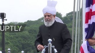 Mirza Masroor Ahmad Present Khalifa of Islam hoisting Flag