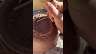 Carving a handmade bowl