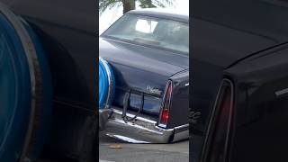 CADILLAC LOWRIDERS SCRAPING BUMPER IN 3 WHEEL MOTION!