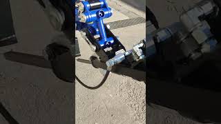 Mini robot equipped with jackhammer for small demolition works.