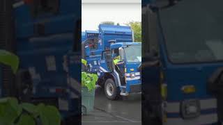 Blue garbage truck in action. #short #garbagetruck #funny