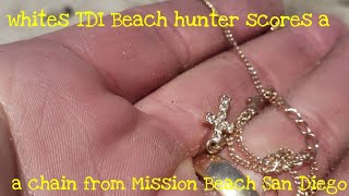 Metal detecting in San Diego with my whites TDI who found a necklace