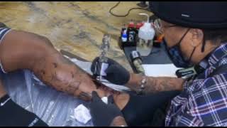 live tattooing adding elements leg piece