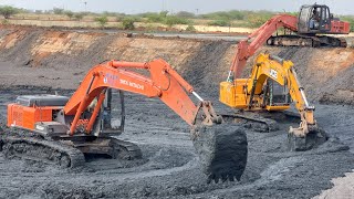 2 TATA 200 with JCB 215 Excavators works together to clean Mud out of Pond