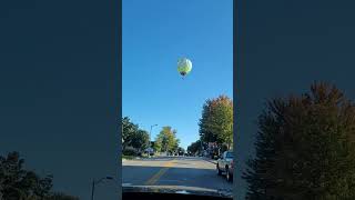 Hot air balloon flying over