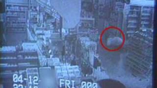 Crawling shoplifter - Looks like girl from 'The Ring', doesn't realize camera can see her