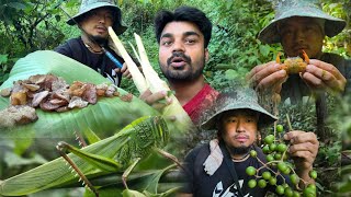 Searching for jungle delicacies  in Nagaland .