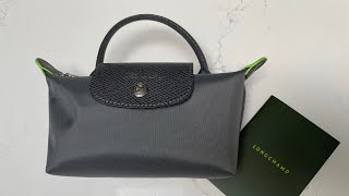 Longchamp Le Pliage Green pouch with handle