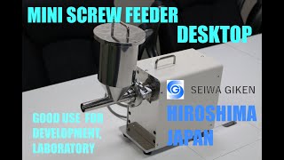 Mini screw(powder)feeder, that is desktop device. It's good use for laboratory,development..etc