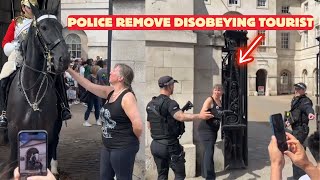 Police Action Against Tourist Ignoring King's Guard Orders.