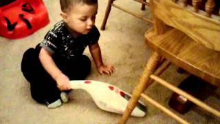 Ray III vacuuming for his Mami