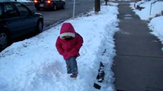 Sophie walks in the snow instead of the sidewalk