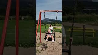 Ailish on the swings in Arran.