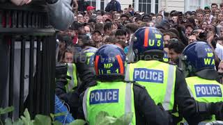 Violent scenes in Trafalgar Square as England fans break through police barricades during match